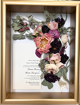 Shadow box gold frame with multi colored flowers